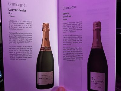 Qatar Airways Business Class Qsuite - Champagner