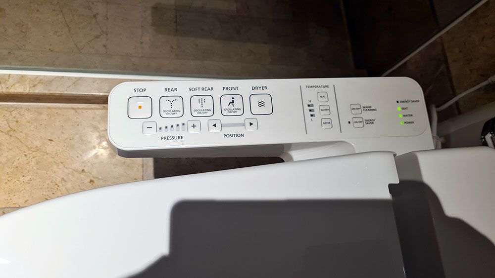 Toilettensitzbedienung